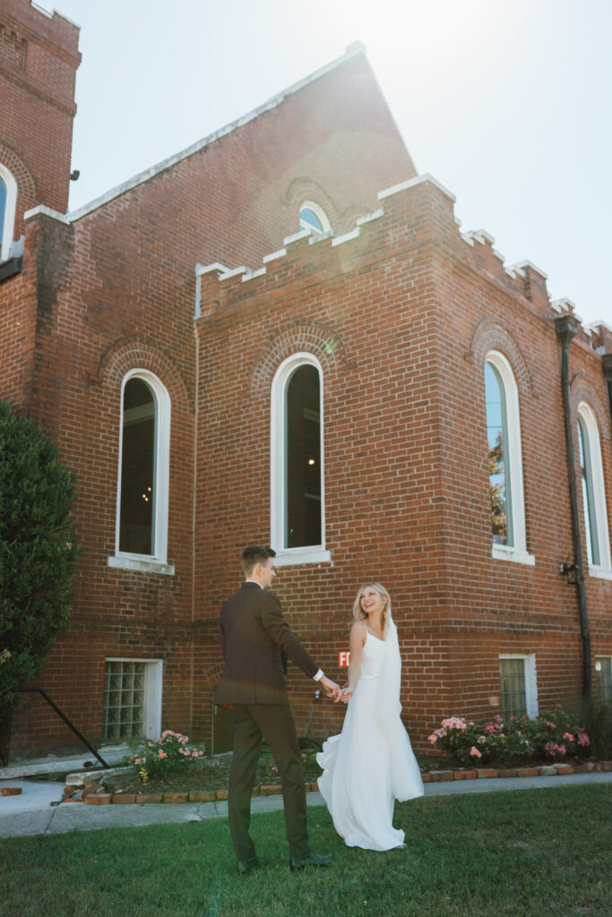 This Fall wedding in Chattanooga Tennessee was stunning with light pouring into their historic wedding venue.