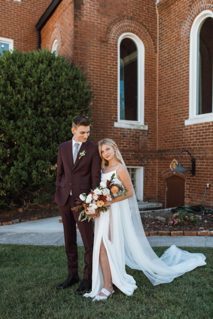 This Fall wedding in Chattanooga Tennessee was stunning with light pouring into their historic wedding venue.