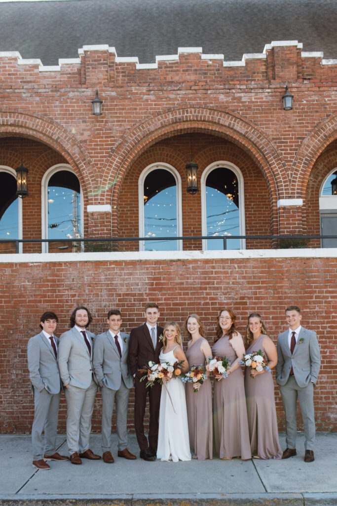 This Fall wedding in Chattanooga Tennessee was stunning with light pouring into their historic wedding venue.