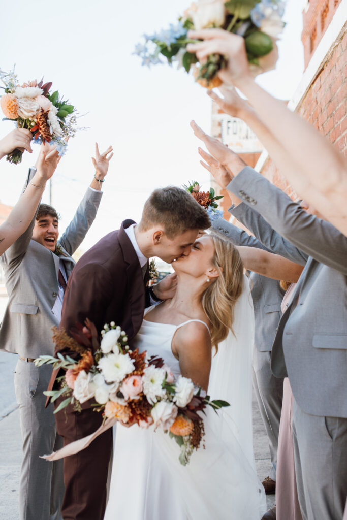 This Fall wedding in Chattanooga Tennessee was stunning with light pouring into their historic wedding venue.