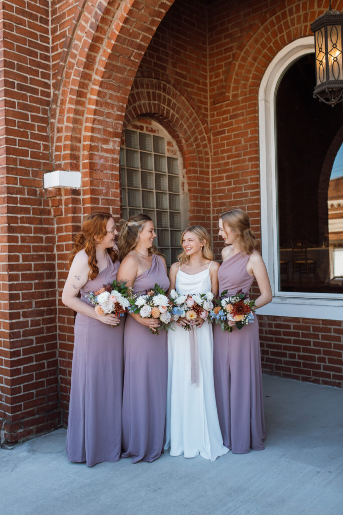 This Fall wedding in Chattanooga Tennessee was stunning with light pouring into their historic wedding venue.