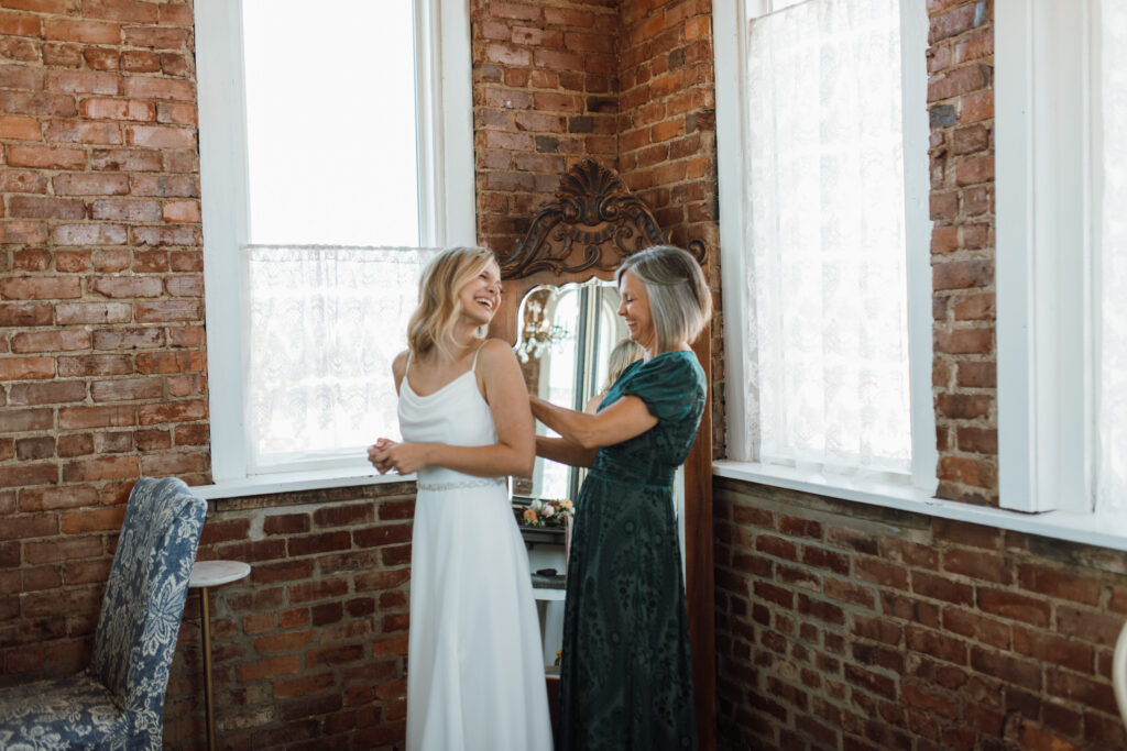 This Fall wedding in Chattanooga Tennessee was stunning with light pouring into their historic wedding venue.