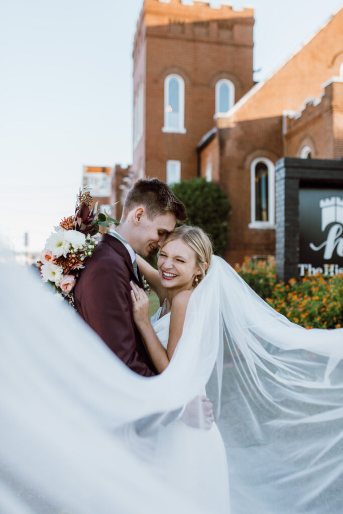 This Fall wedding in Chattanooga Tennessee was stunning with light pouring into their historic wedding venue.